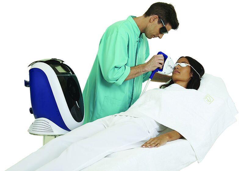 Man using eye drops